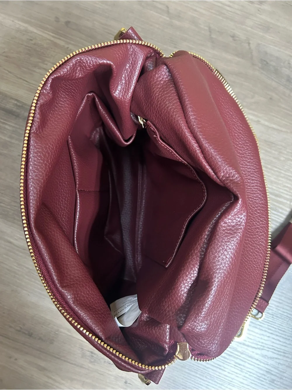 Fawn Design Pebbled Crossbody Backpack in Burgundy